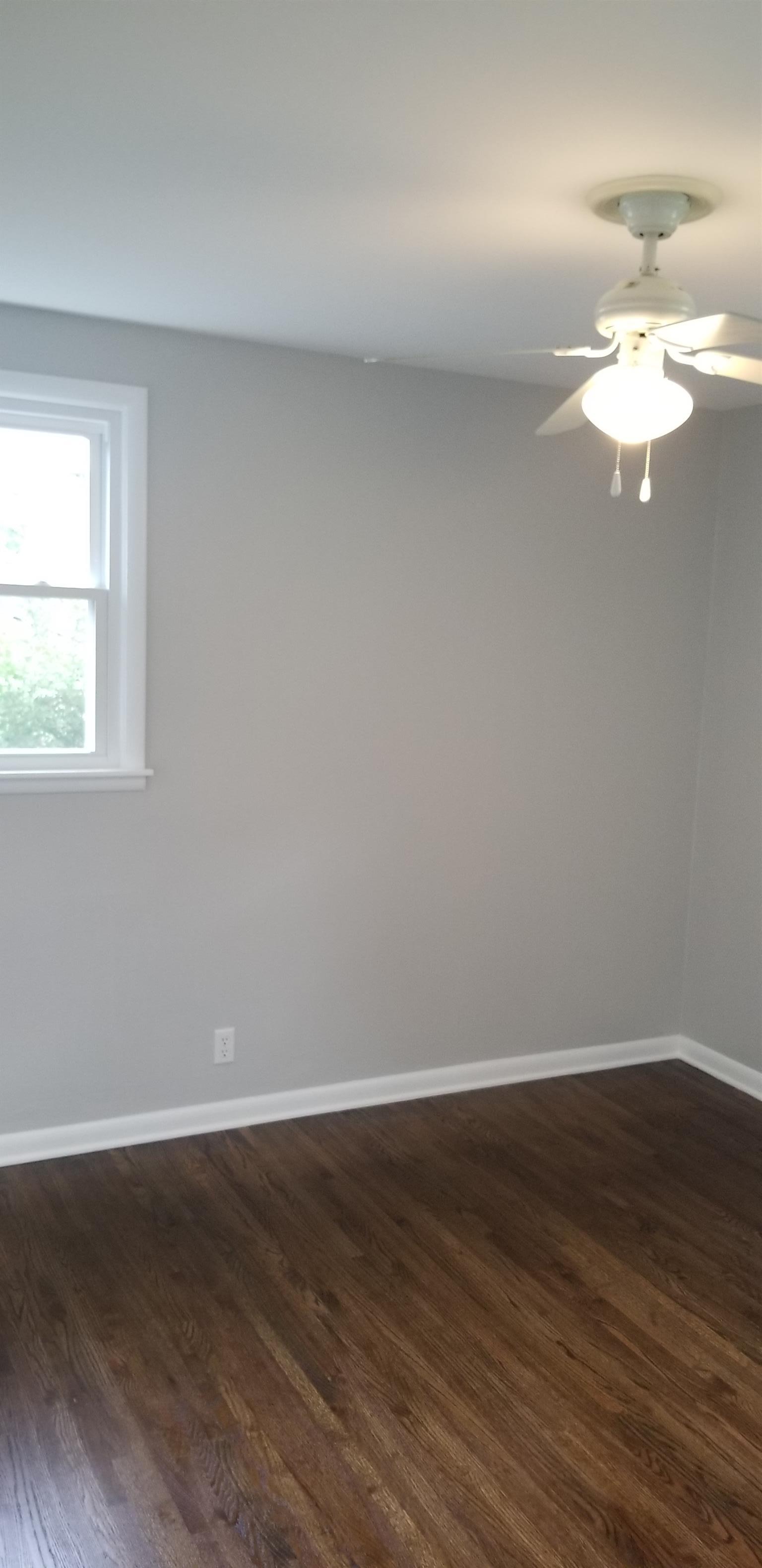 207 South Valley Road Hendersonville, TN 37075 - Photo 9 of 21 a view of a room with wooden floor and window