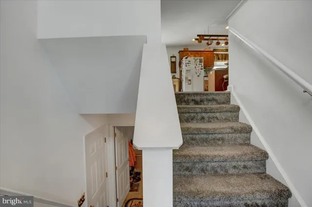 a view of entryway with wooden floor