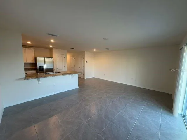 a view of a kitchen with a sink
