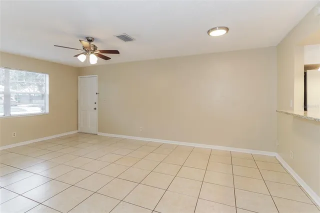 a view of an empty room and window
