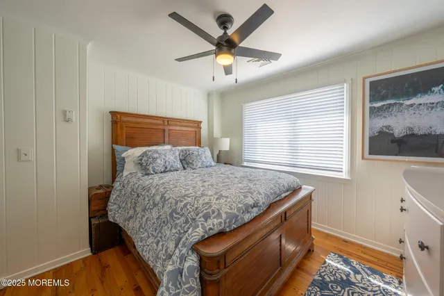 a living room with kitchen island furniture and a window