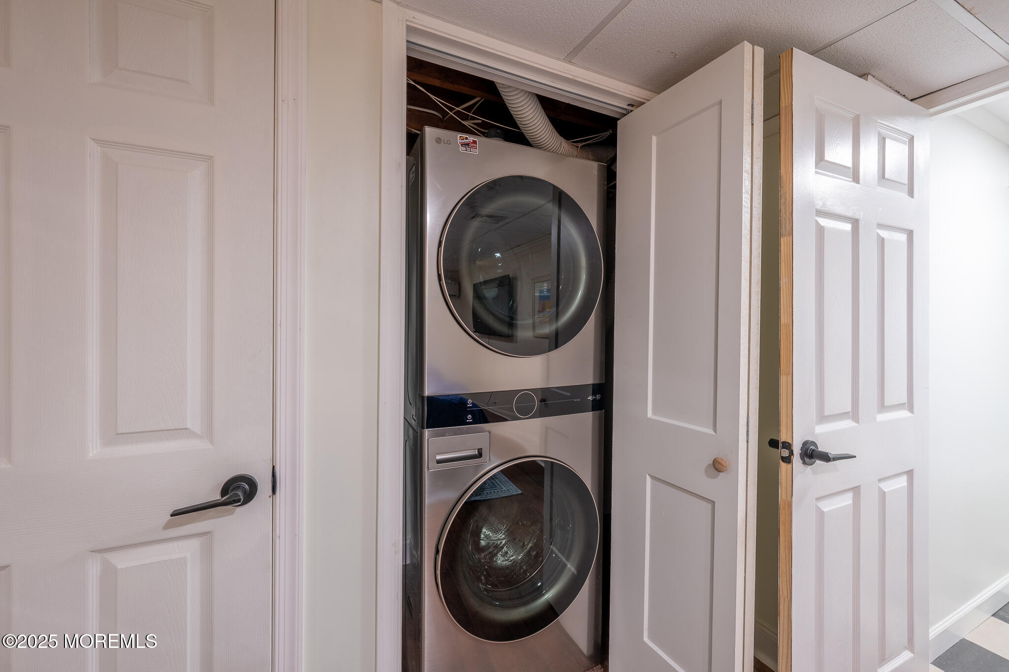 14 Falls Road Mantoloking, NJ 08738 - Photo 22 of 40 a utility room with dryer and washer