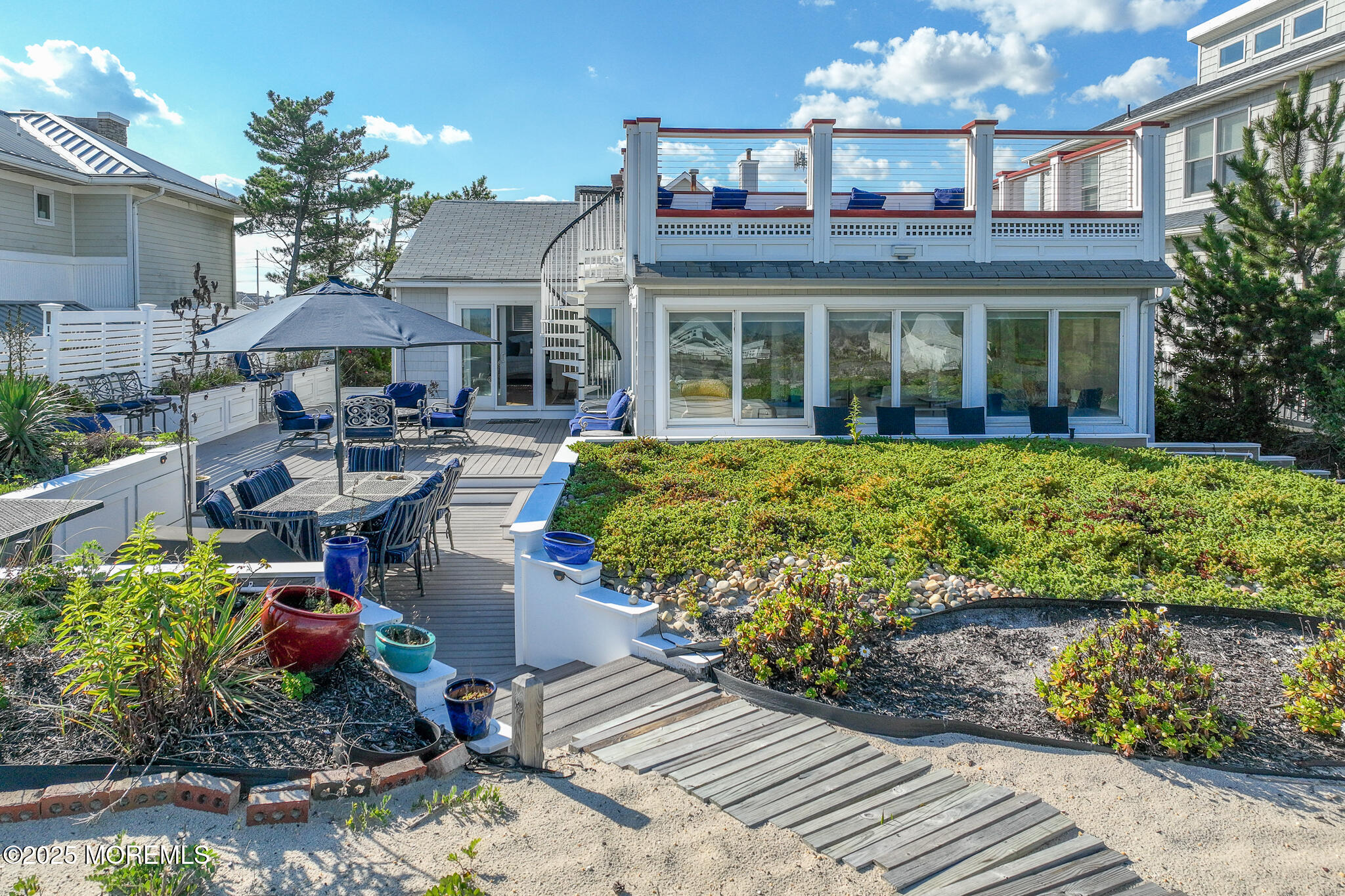 14 Falls Road Mantoloking, NJ 08738 - Photo 31 of 40 a view of a house with patio