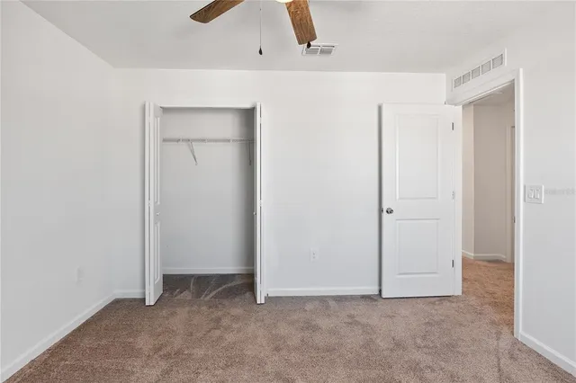 an empty room with closet