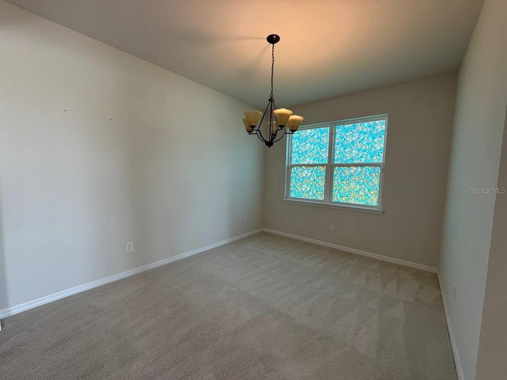 14112 Poke Ridge Drive Riverview, FL 33579 - Photo 26 of 32 an empty room with a window