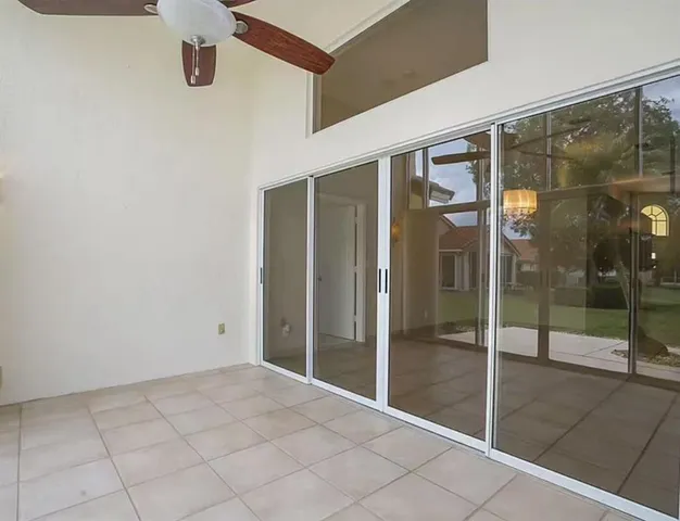 a view of an empty room and window