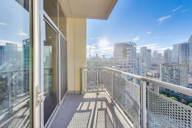 a view of a balcony with city view