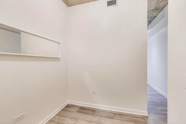 a view of small space with racks on the wall