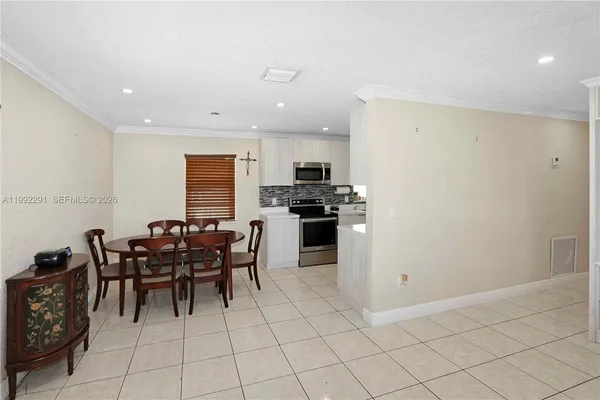 a view of a dining room with furniture