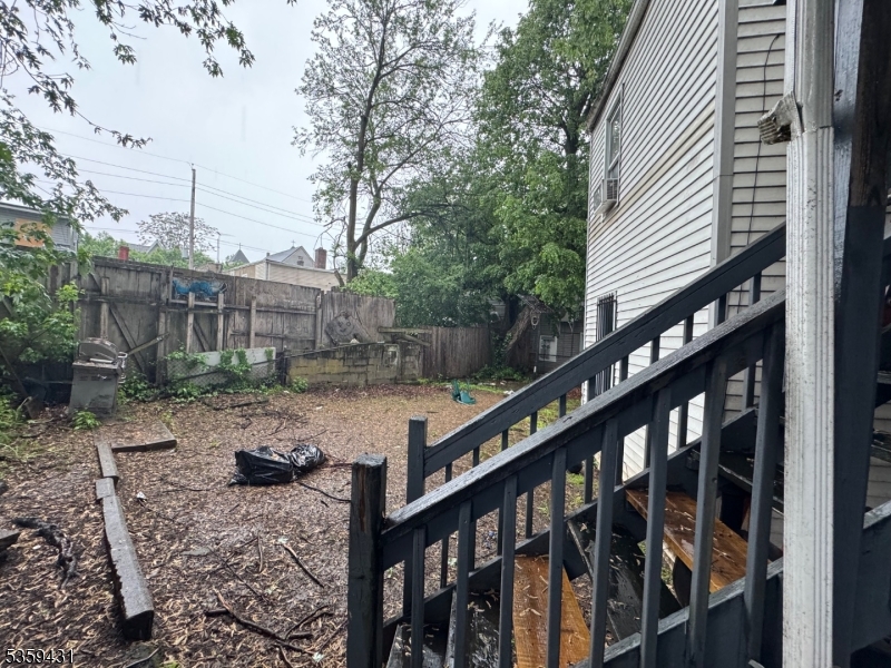 57 East Main Street Paterson, NJ 07522 - Photo 20 of 20 a view of a house with backyard and trees