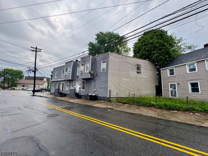 57 East Main Street Paterson, NJ 07522 - Photo 8 of 20 a view of street with large house
