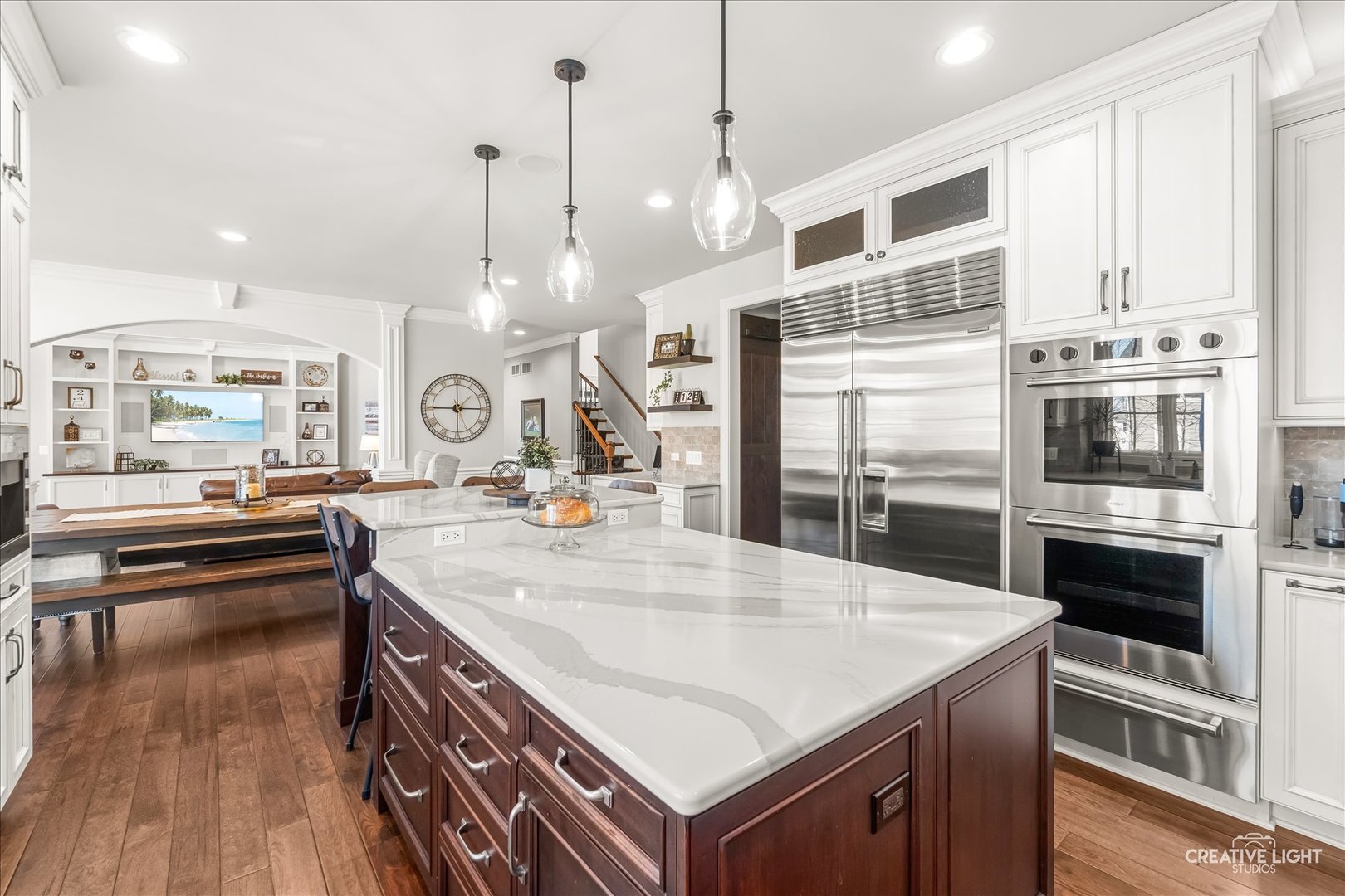 3680 Broadleaf Avenue Elgin, IL 60124 - Photo 12 of 69 a kitchen with stainless steel appliances granite countertop a stove a sink a oven a kitchen island with wooden cabinets and floor