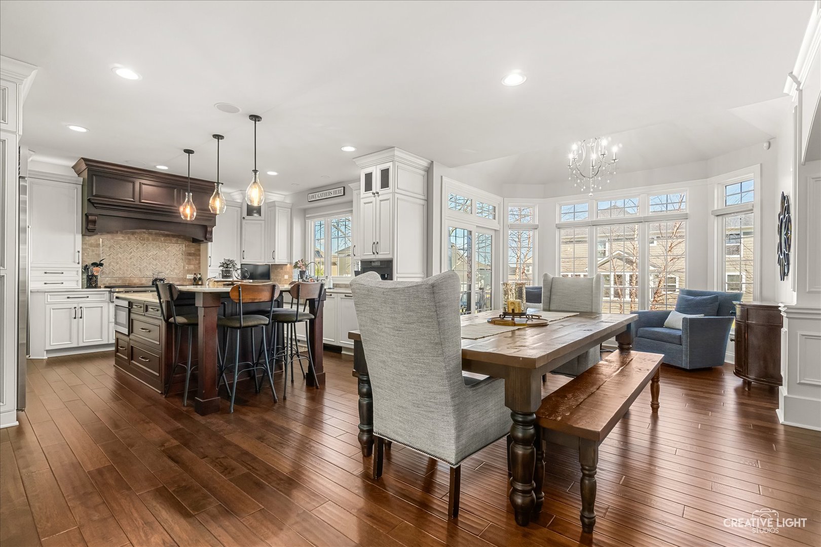 3680 Broadleaf Avenue Elgin, IL 60124 - Photo 13 of 69 a view of a dining room with furniture and wooden floor