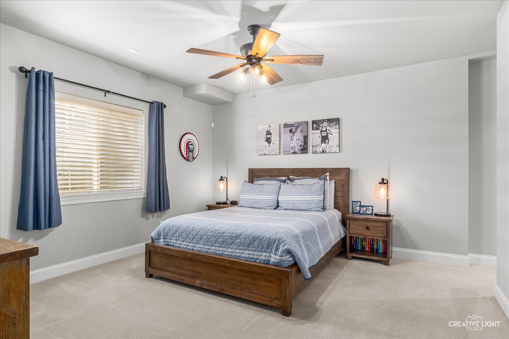 3680 Broadleaf Avenue Elgin, IL 60124 - Photo 34 of 69 a bedroom with a bed and a chandelier