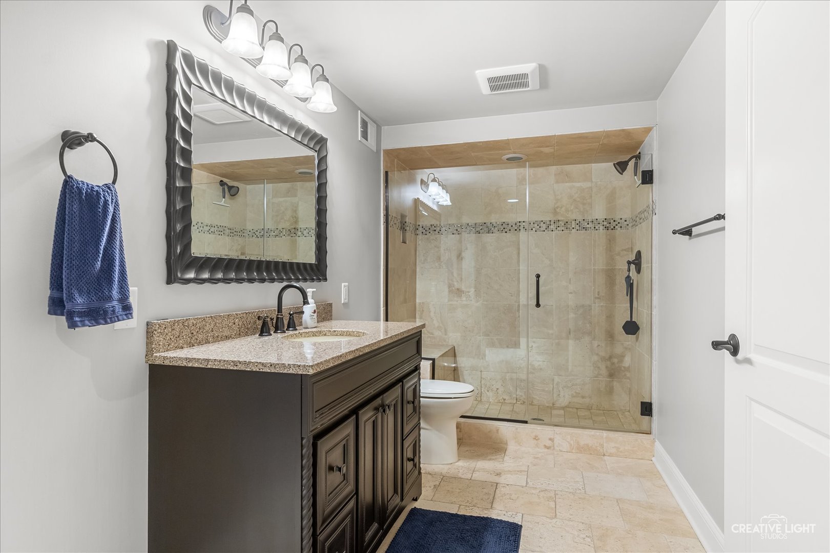 3680 Broadleaf Avenue Elgin, IL 60124 - Photo 35 of 69 a bathroom with a double vanity sink mirror and shower