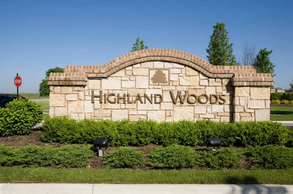 3680 Broadleaf Avenue Elgin, IL 60124 - Photo 62 of 69 a view of a house with a garden and signage