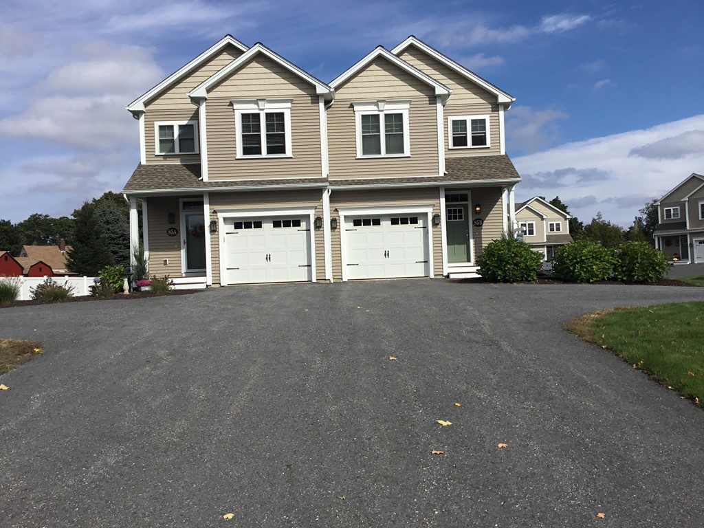 85 B Maple Avenue, Unit B Rutland, MA 01543 - Photo 1 of 19 a front view of a house with a garden
