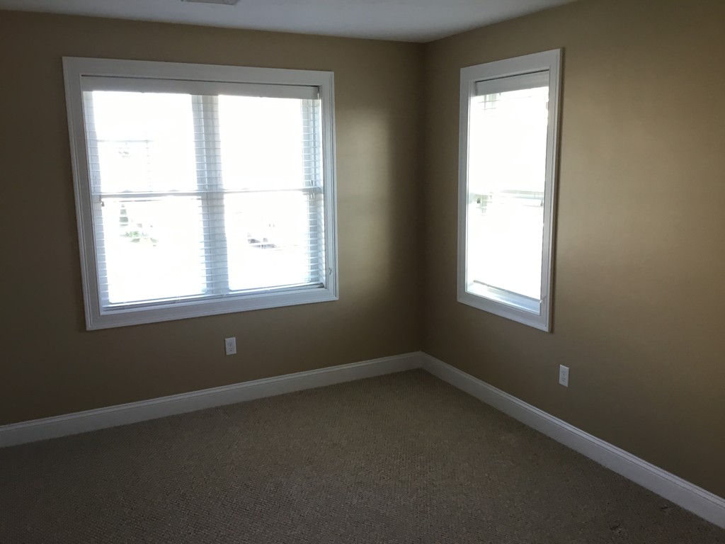 85 B Maple Avenue, Unit B Rutland, MA 01543 - Photo 14 of 19 an empty room with a window