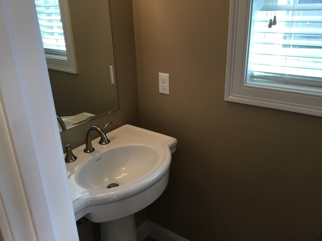 85 B Maple Avenue, Unit B Rutland, MA 01543 - Photo 7 of 19 a bathroom with a sink and a toilet