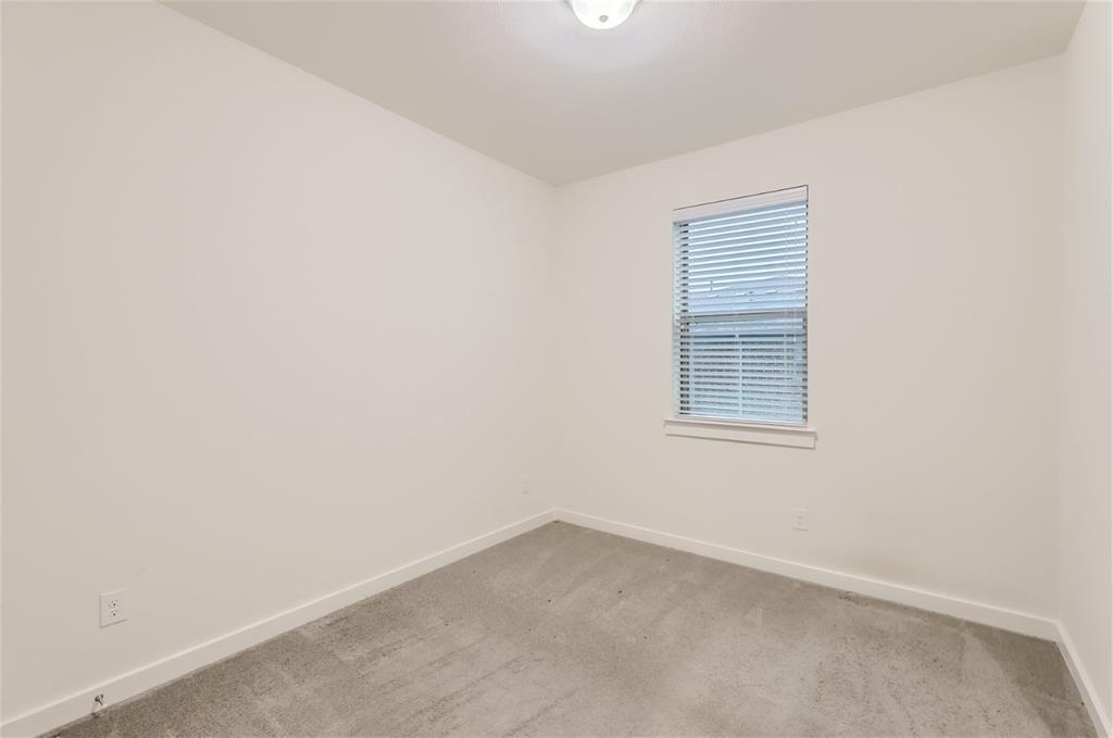 401 Division Street Plano, TX 75075 - Photo 20 of 28 an empty room with a window