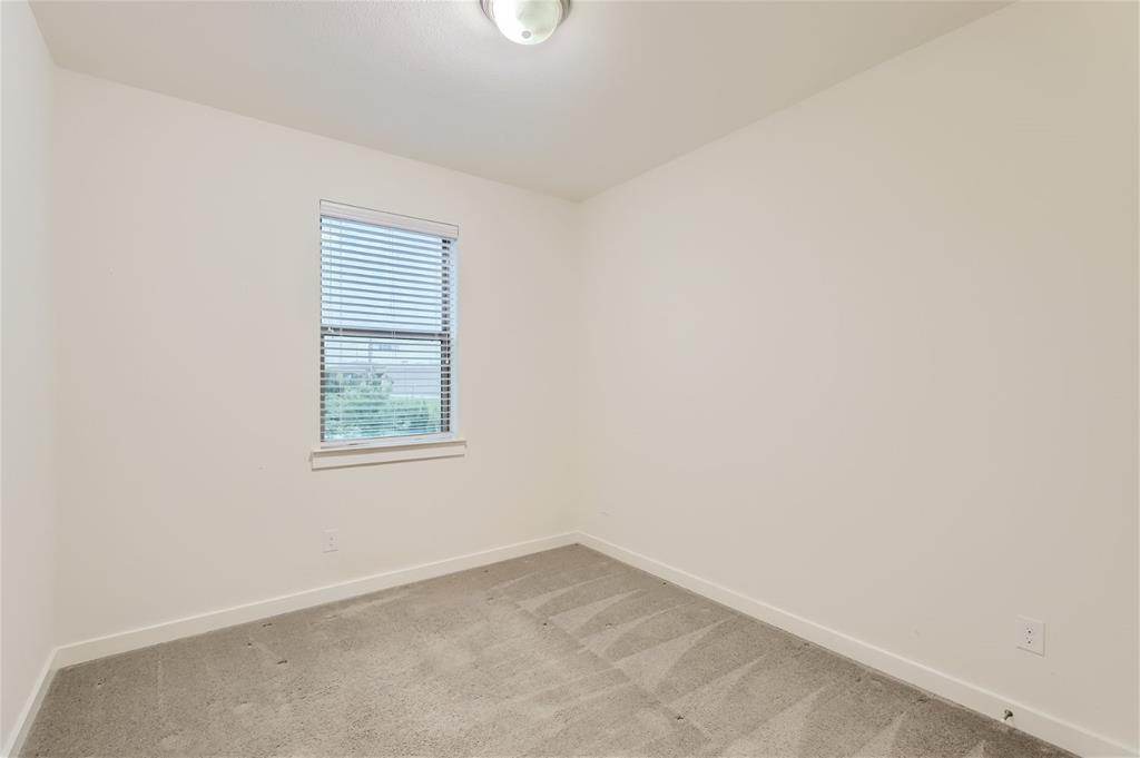 401 Division Street Plano, TX 75075 - Photo 21 of 28 an empty room with a window