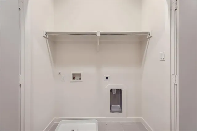 a bathroom with a bathtub shower sink vanity mirror and toilet