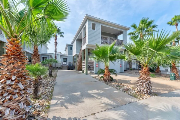 a view of a backyard with a patio