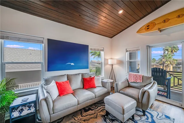 a living room with furniture and a couch