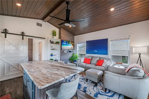 a living room with furniture and a table