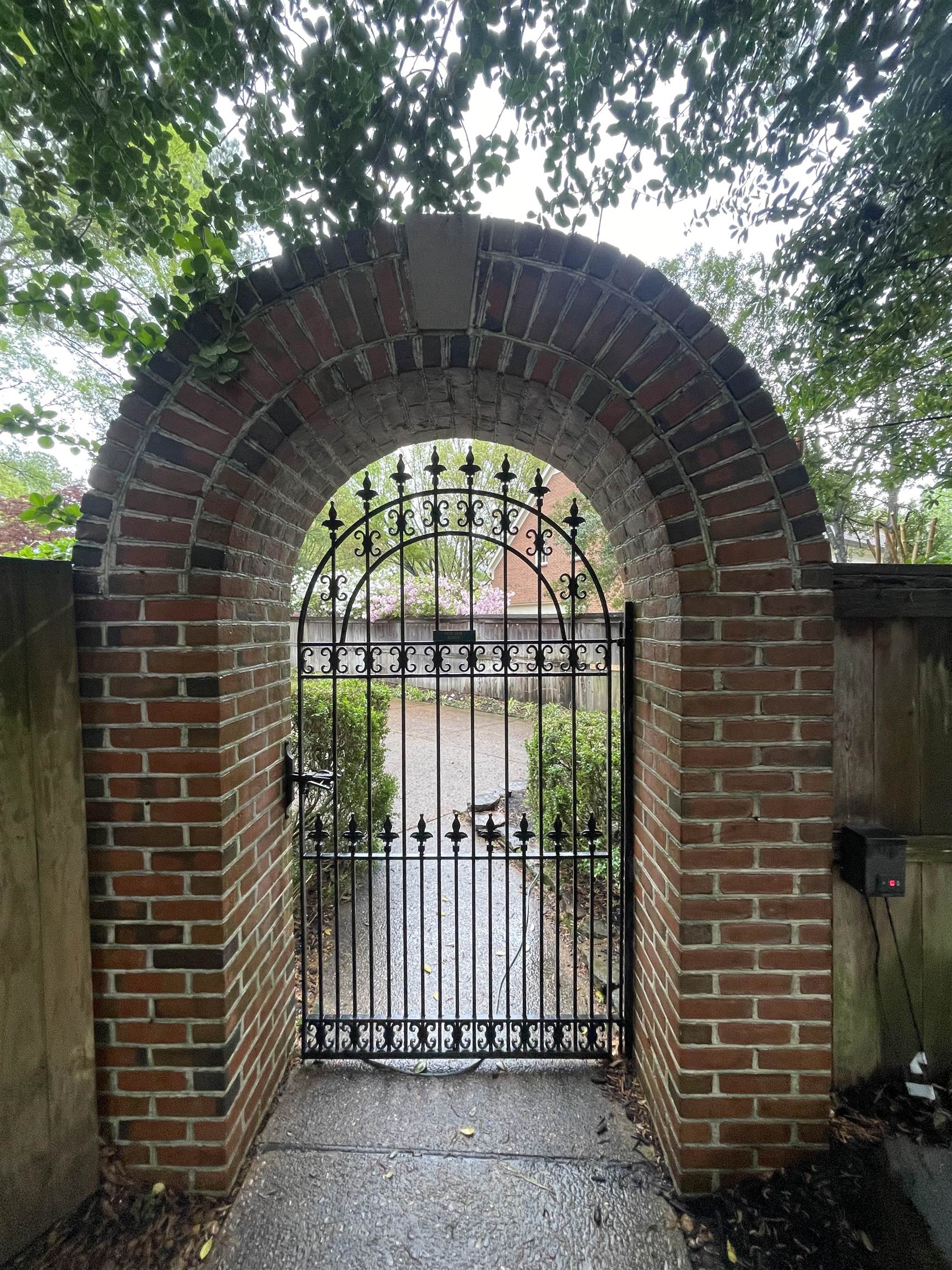8711 Windrush Memphis, TN 38125 - Photo 14 of 40 a view of entrance gate of house