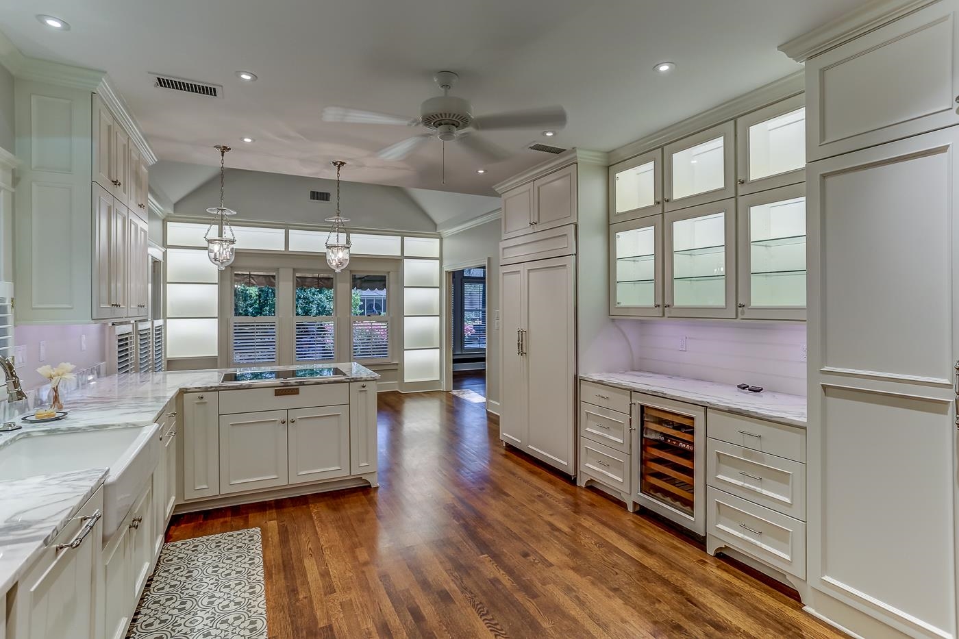 8711 Windrush Memphis, TN 38125 - Photo 19 of 40 a open kitchen with stainless steel appliances a stove refrigerator and cabinets
