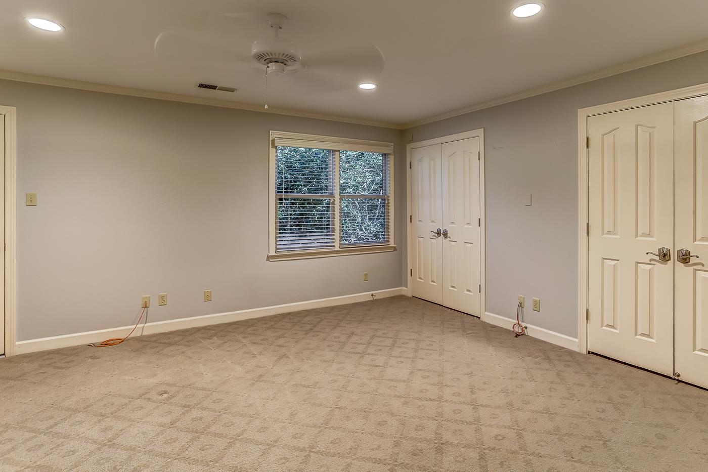 8711 Windrush Memphis, TN 38125 - Photo 34 of 40 an empty room with windows