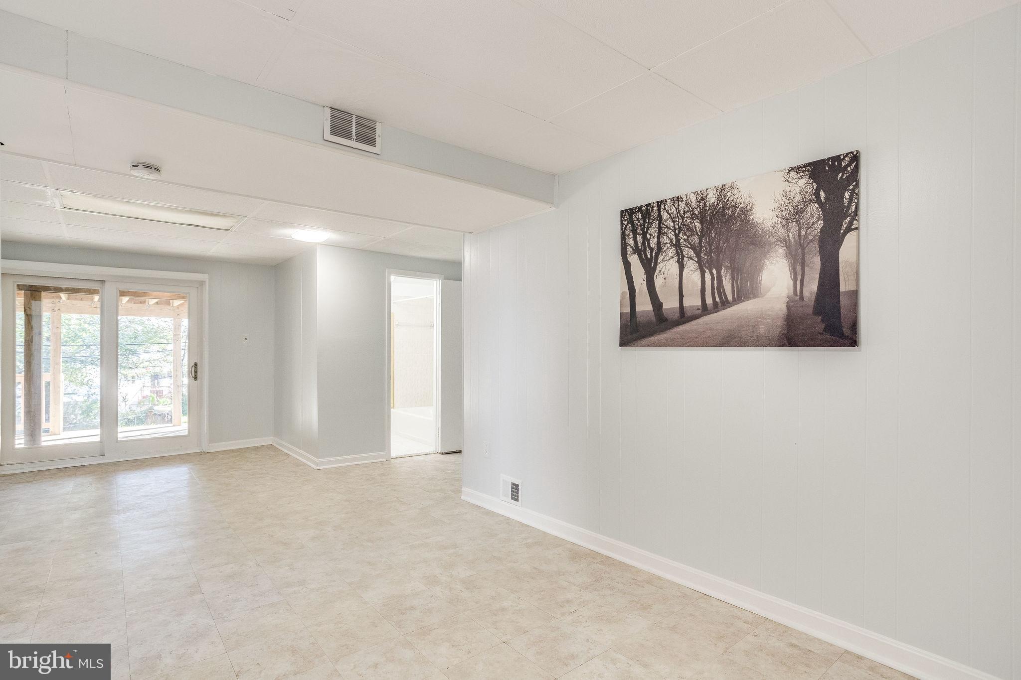 1104 11th Street Laurel, MD 20707 - Photo 32 of 59 Family Room with Walkout Basement