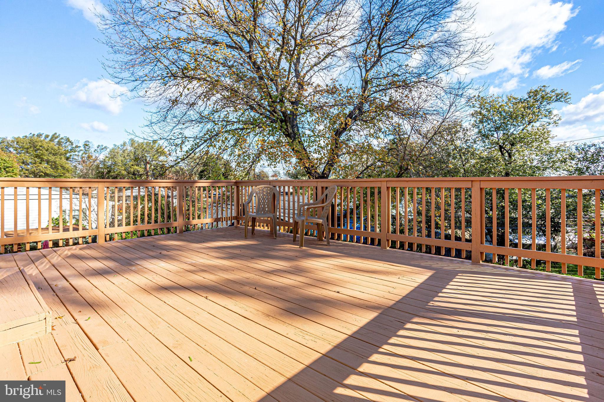 1104 11th Street Laurel, MD 20707 - Photo 56 of 59 Deck with stairs leading to backyard