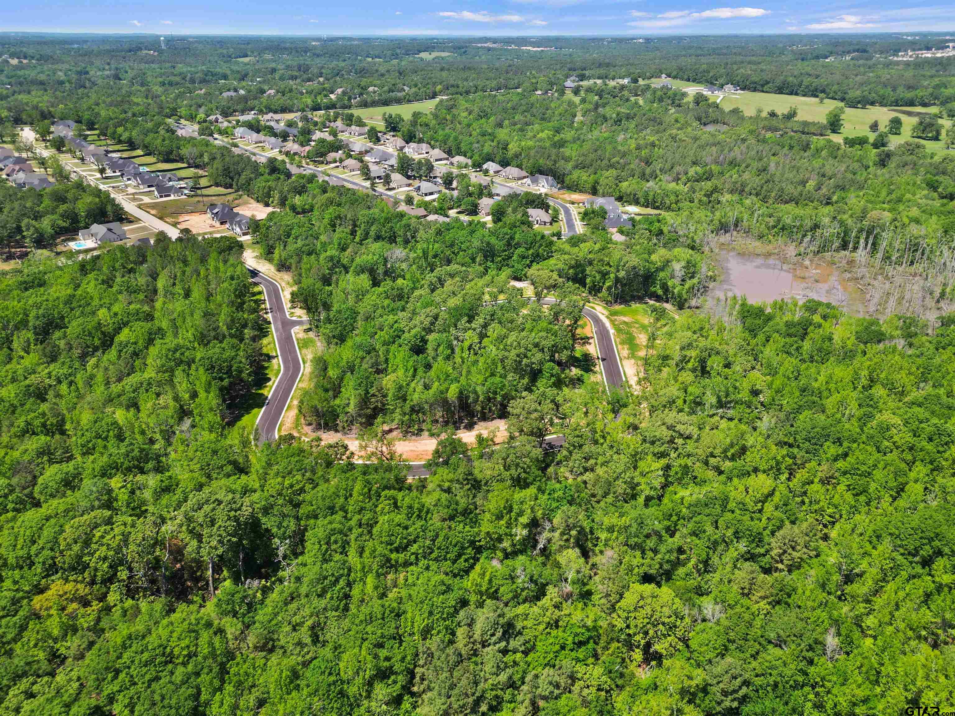 Stafford Drive Tyler, TX 75703 - Photo 4 of 15 an aerial view of residential houses with outdoor space and trees