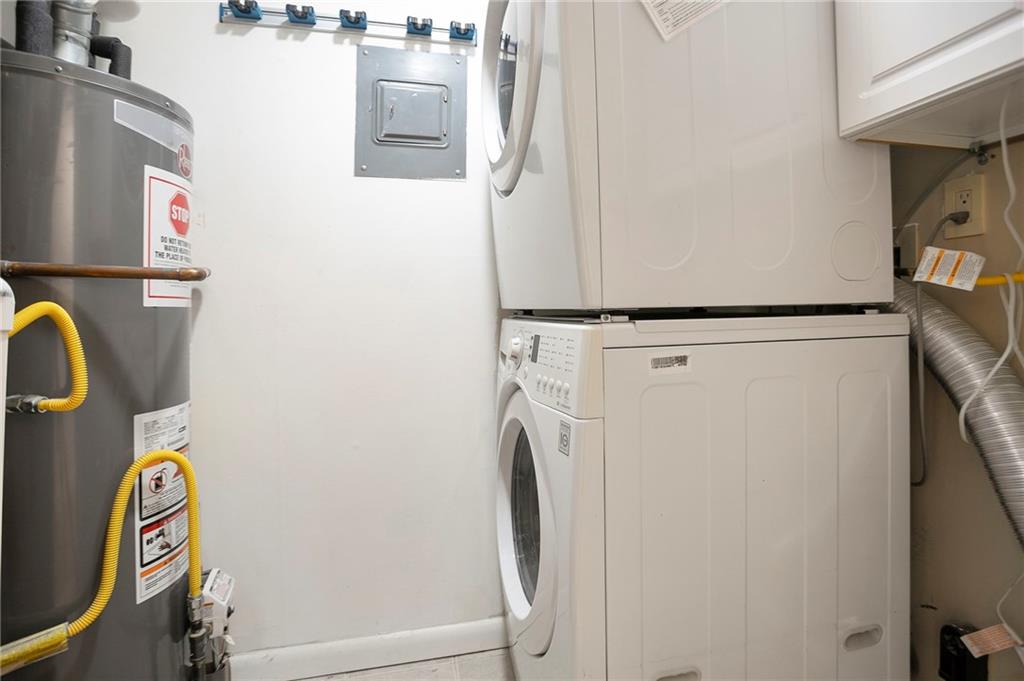 408 River Run Drive Sandy Springs, GA 30350 - Photo 18 of 34 a utility room with dryer and washer