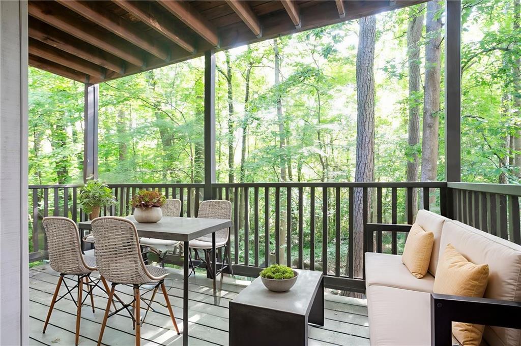 408 River Run Drive Sandy Springs, GA 30350 - Photo 24 of 34 a view of a patio with a table and chairs
