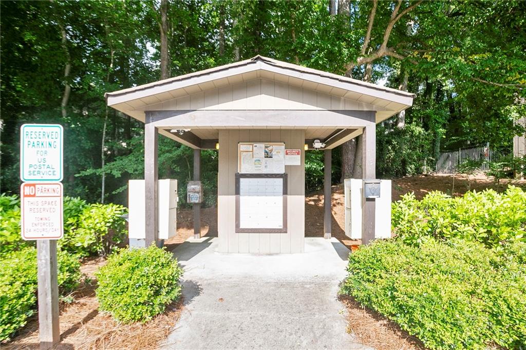 408 River Run Drive Sandy Springs, GA 30350 - Photo 26 of 34 a front view of a house with a porch