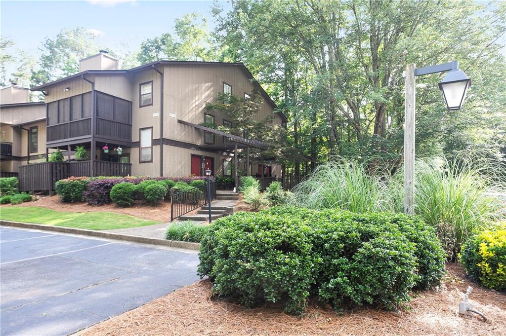 408 River Run Drive Sandy Springs, GA 30350 - Photo 27 of 34 a view of a house next to a yard