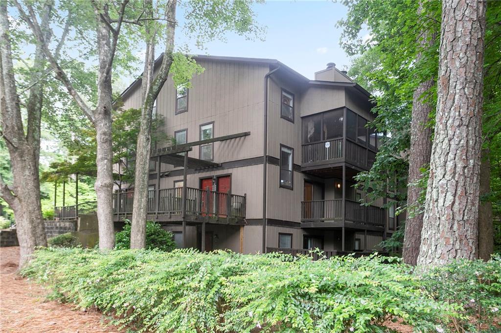408 River Run Drive Sandy Springs, GA 30350 - Photo 29 of 34 front view of a house with a small yard
