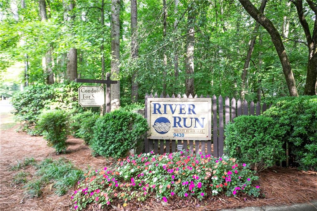 408 River Run Drive Sandy Springs, GA 30350 - Photo 30 of 34 a sign that is in front of flowers