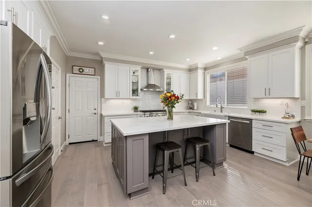 a bedroom with a bed and a table