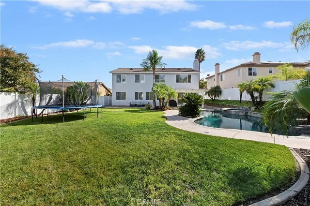 an aerial view of residential house and green space
