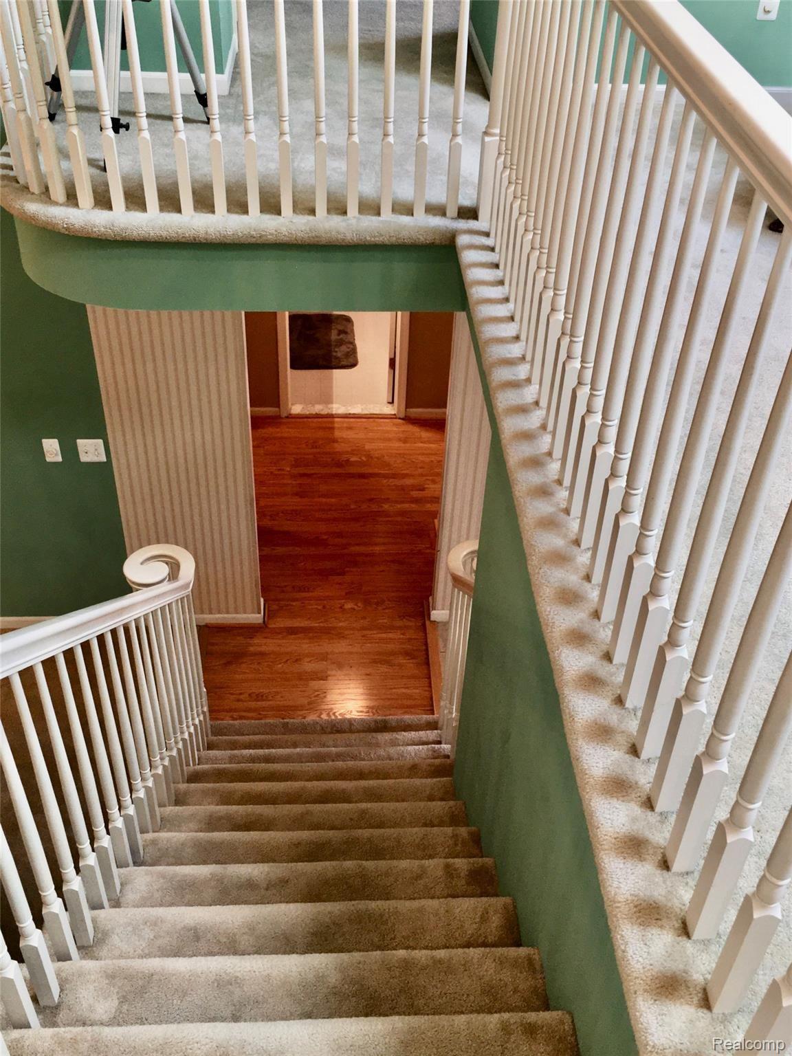 52103 Southview Ridge, Unit 61 Macomb, MI 48042 - Photo 29 of 29 Staircase.jpg
