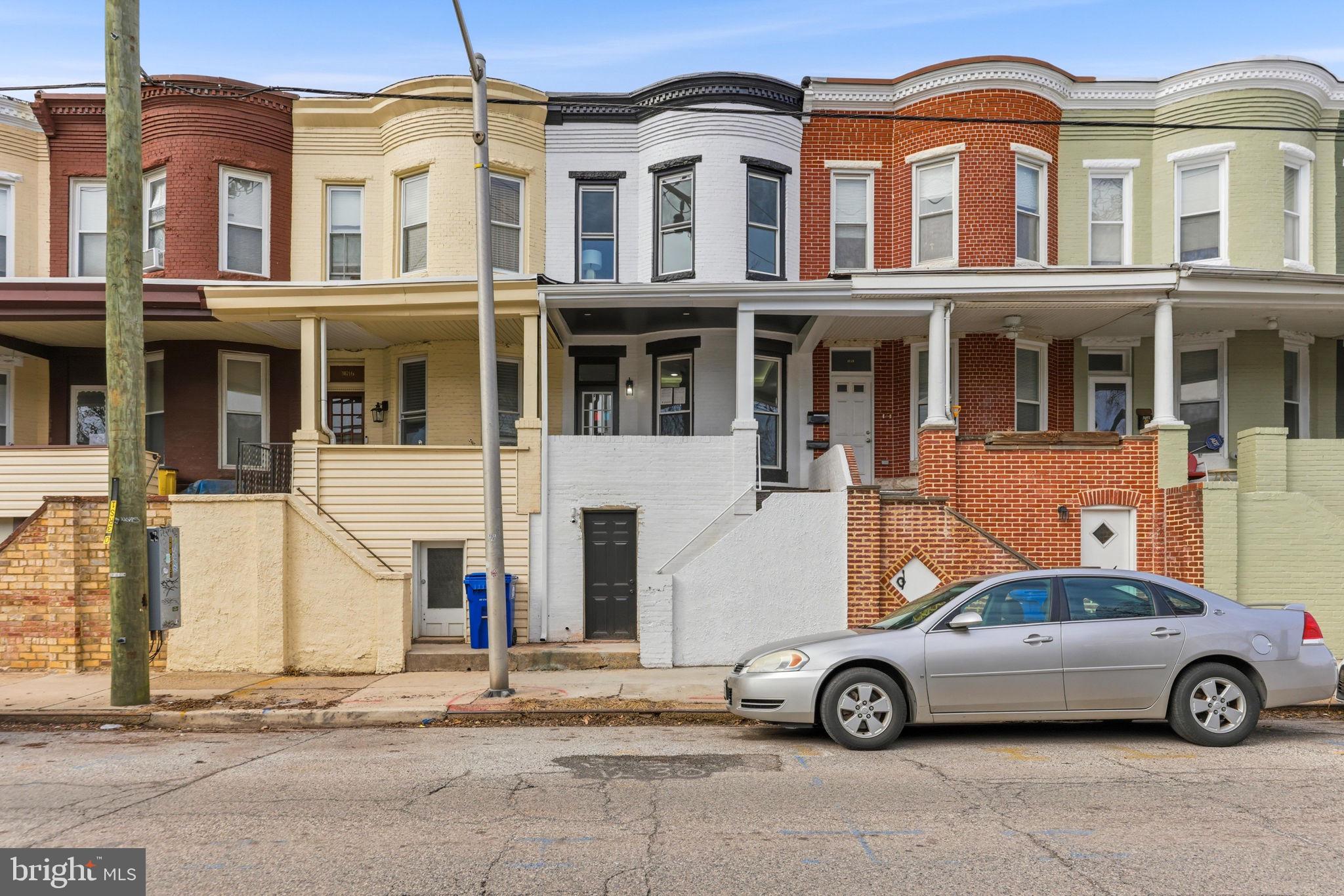 3618 Keswick Road Baltimore, MD 21211 - Photo 2 of 39 a car parked in front of a building
