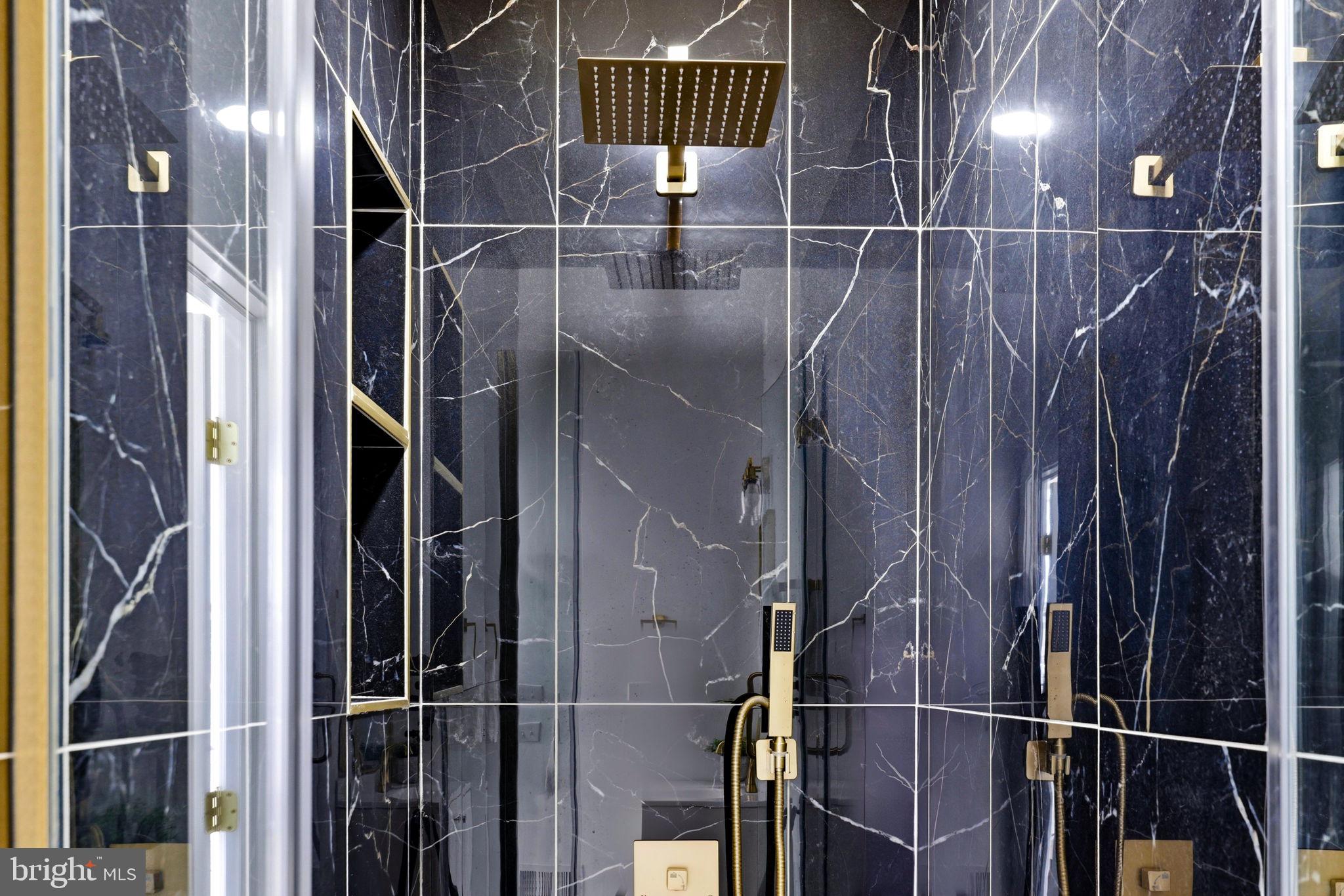 3618 Keswick Road Baltimore, MD 21211 - Photo 25 of 39 a bathroom with a shower