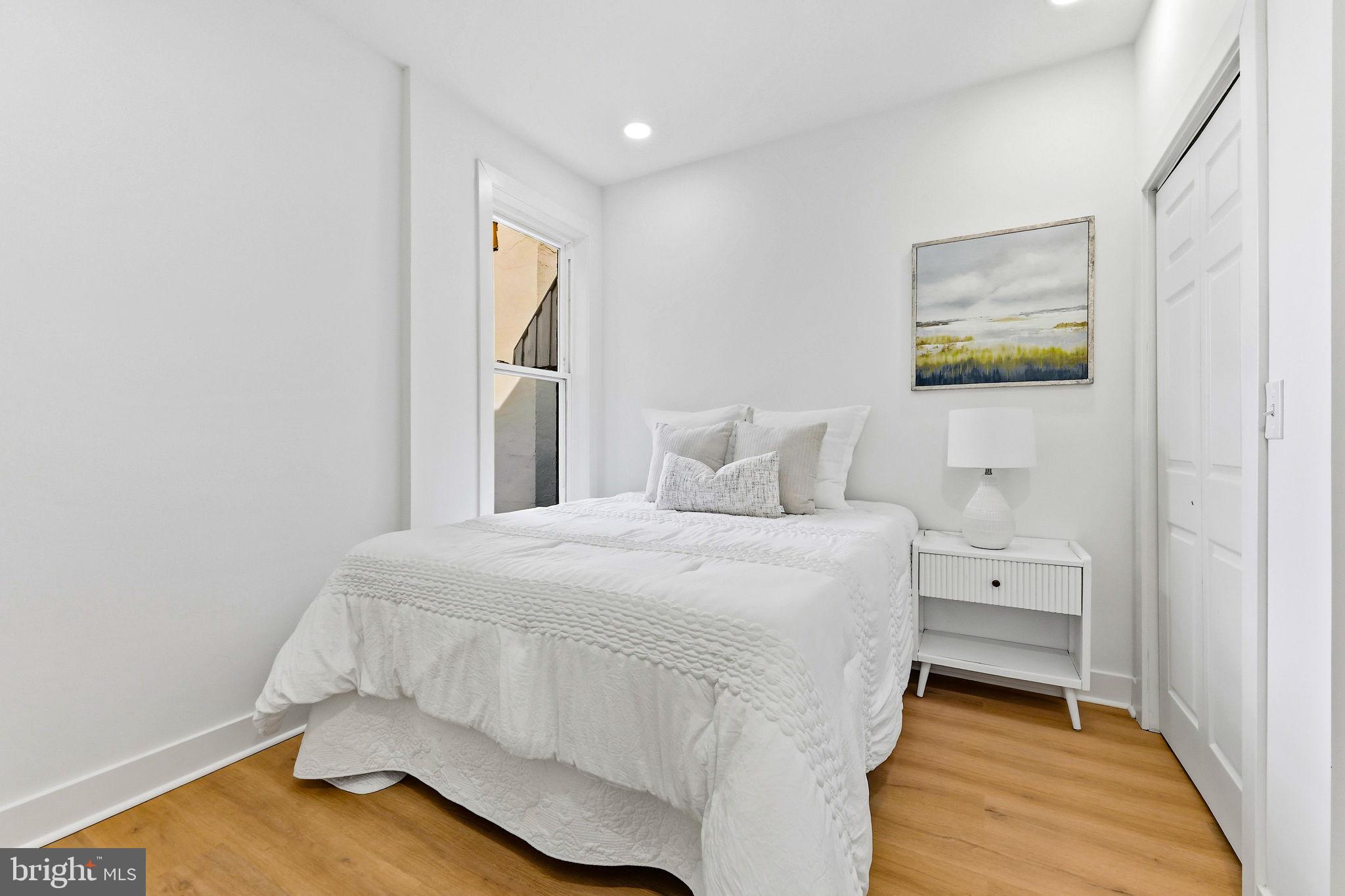 3618 Keswick Road Baltimore, MD 21211 - Photo 27 of 39 a bedroom with a bed and a window