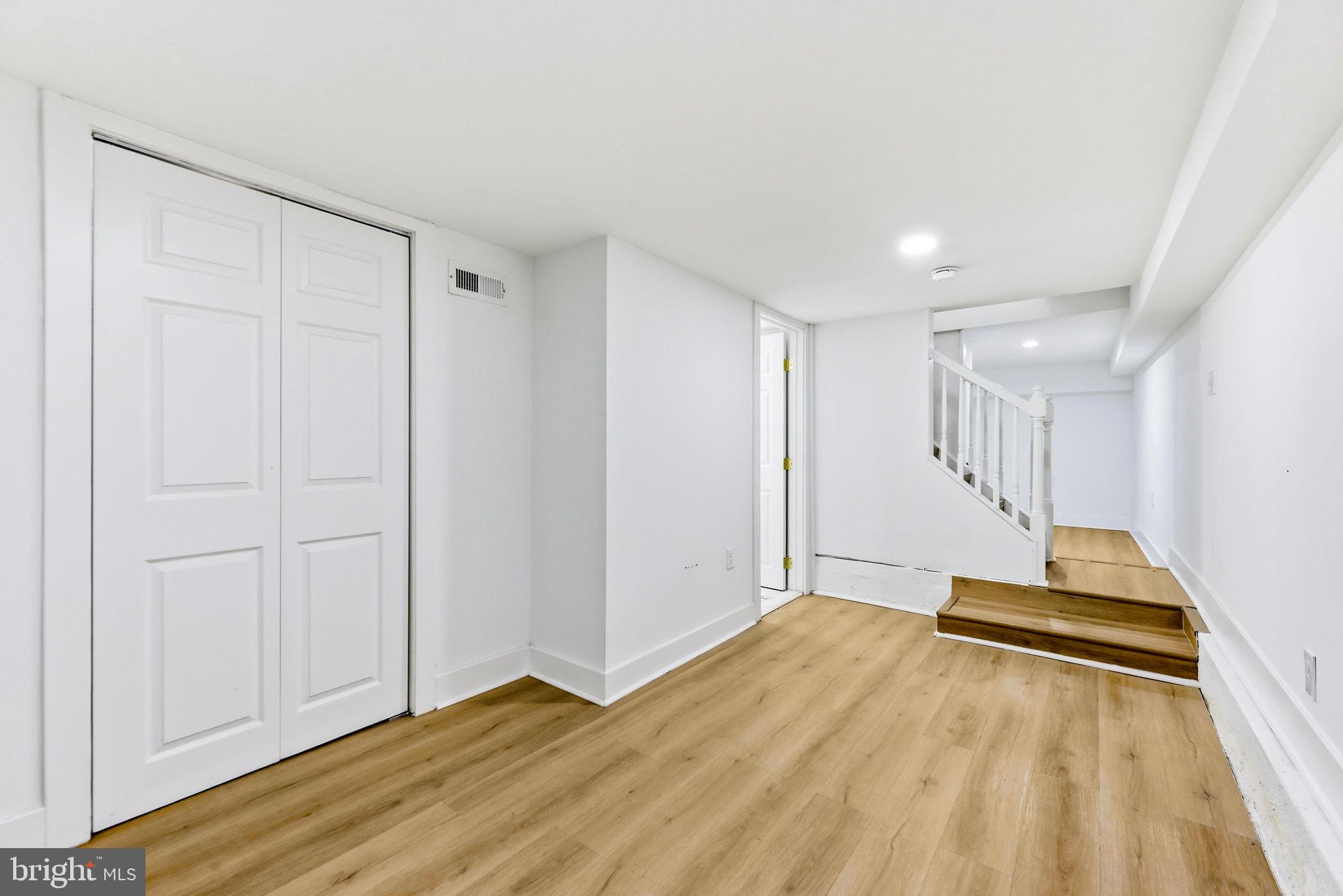 3618 Keswick Road Baltimore, MD 21211 - Photo 33 of 39 a view of empty room with wooden floor