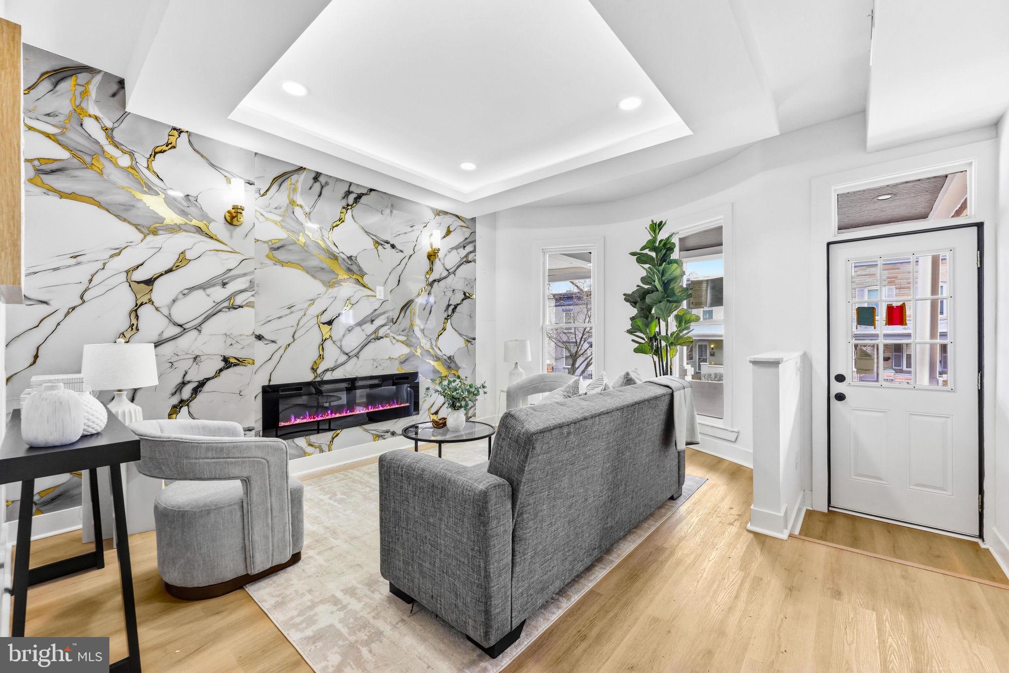 3618 Keswick Road Baltimore, MD 21211 - Photo 5 of 39 a living room with furniture and a flat screen tv