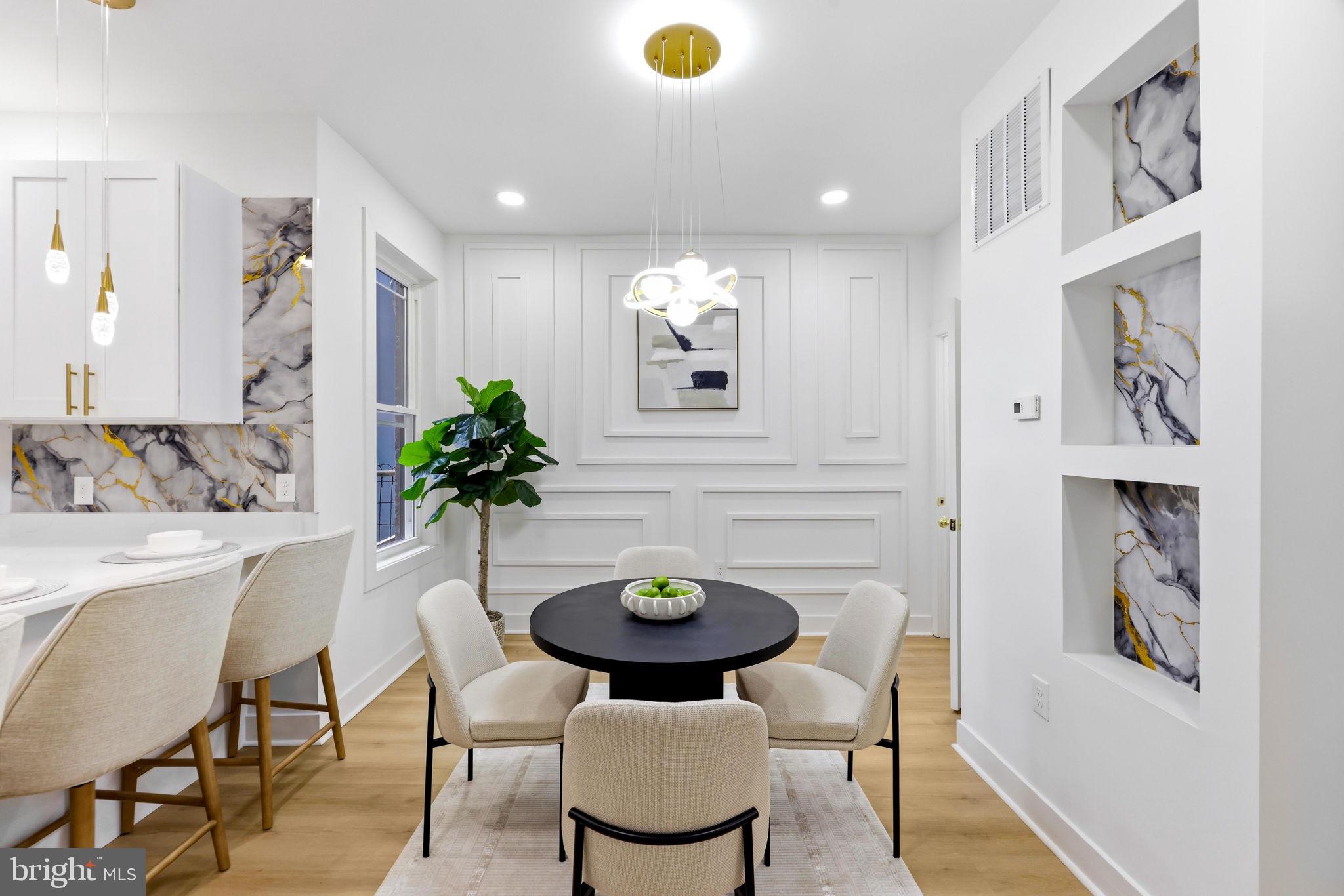 3618 Keswick Road Baltimore, MD 21211 - Photo 10 of 39 a view of a dining room with furniture and wooden floor